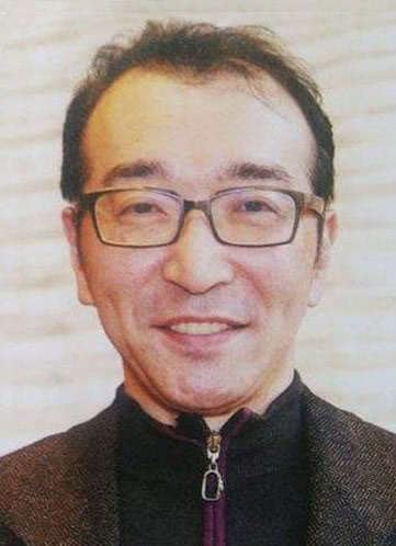 富堅義博