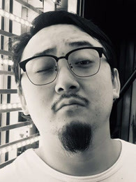 許棕哲